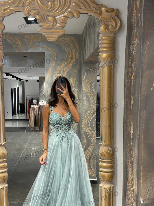 Elegant Spaghetti-Strap Mermaid Prom Dress with Appliques and Beadings