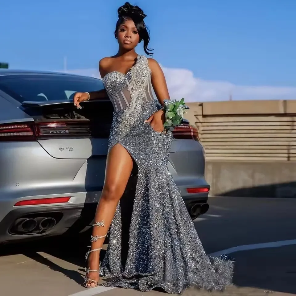 Customized 2026 Luxurious Shiny Silver Sequin Decal Mermaid Dance Dress One Shoulder V-Neck Side Slit Sexy Formal Party Dresses